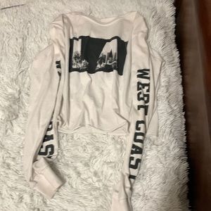 LA shirt , white , long sleeved , crop top